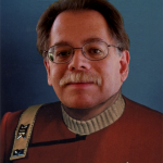Dennis Amador Cherry in Star Trek uniform regalia – Co Conspirator at Second Geekhood