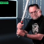 The AFOL Husband with Star Wars Lightsaber at Second Geekhood